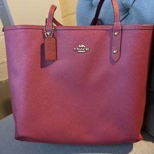 COACH, reversible, shoulder bag. Fuchsia, pink, and traditional. Coloring.